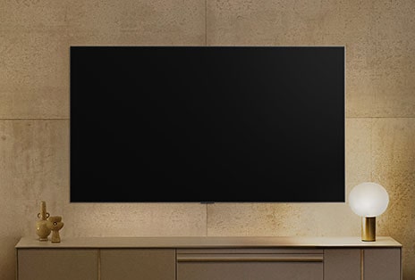 LG TV displaying artwork while powered down, showing Always Ready mode